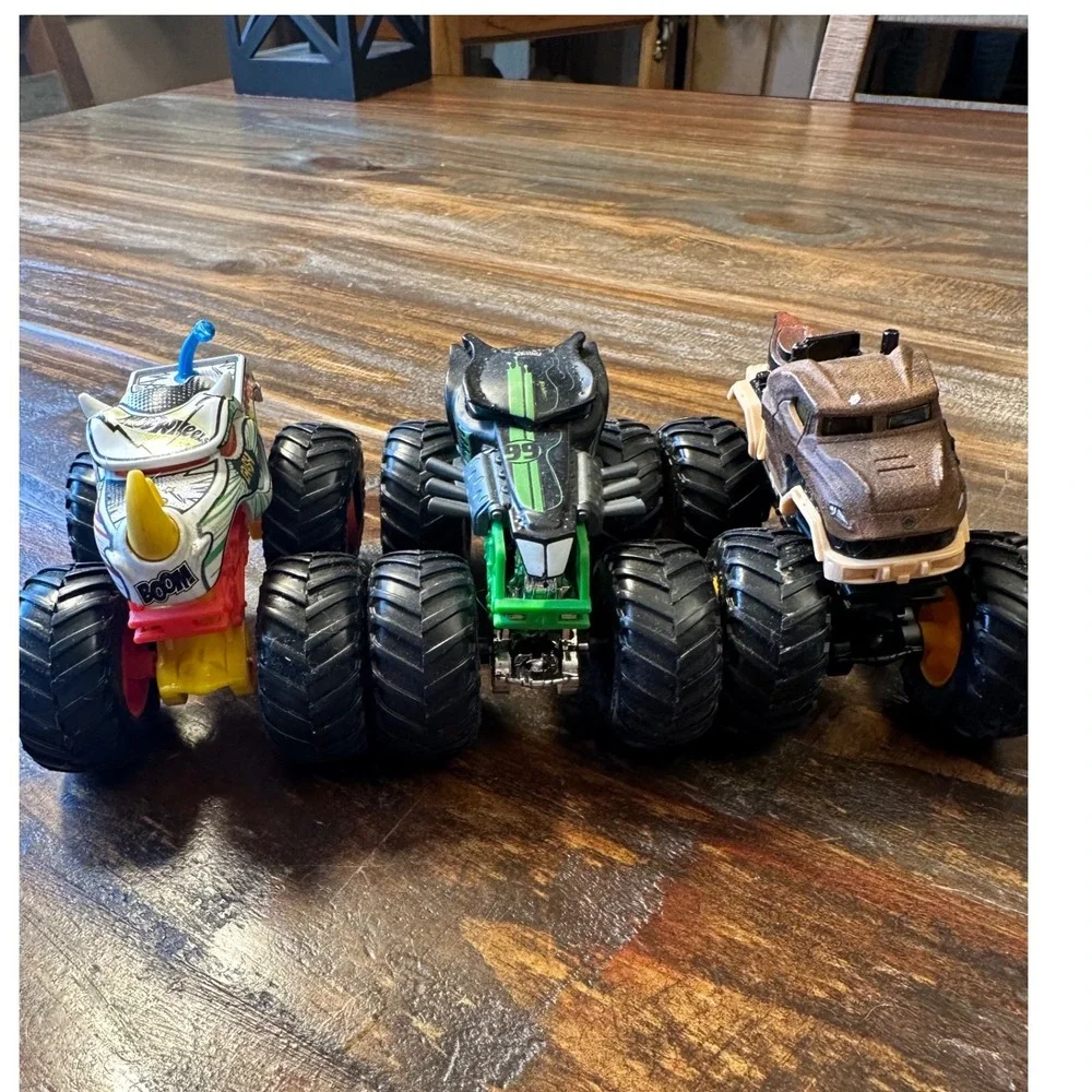 Monster Jam Truck HotWheel Lot of 3 1:64  Rhinomite Jurassic World Radical Racer